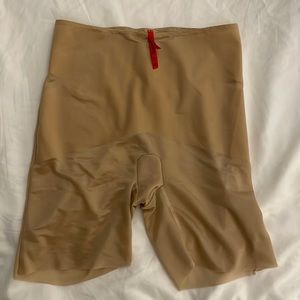 Beige shapewear shorts. High waisted tummy control